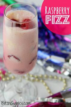 
                    
                        Raspberry Fizz - A creamy concoction of fresh raspberries, sherbet and ice cream mixed with fizzy lemon-lime soda or champagne. Perfect for New Year's Eve!
                    
                