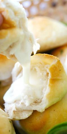 
                    
                        Garlic Herb Cheese Bombs ~ Amazing cheese bomb biscuits loaded with Mozzarella cheese and topped with garlic herb butter. 20-min easy recipe
                    
                