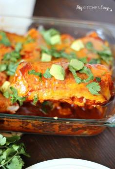 
                    
                        Chicken & Sweet Potato Enchiladas ~ www.mykitchencraz... ~ Tortillas filled with chicken, sweet potatoes and black beans, then smothered in enchilada sauce and cheese! Delicious!
                    
                