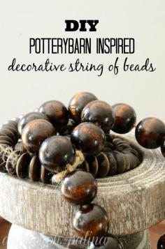 Create your own Pottery Barn inspired decorative string of beads in just a few easy steps. By using this do-it-yourself method you can customize the string of beads to fit your personal decor for a fraction of the cost. #potterybarn