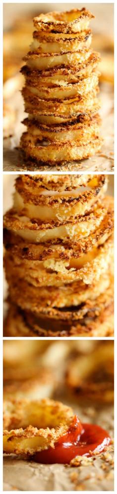 Oven Baked Onion Rings.  Baked in the oven to crisp perfection and no oil needed.  May not be the healthiest snack but certainly better than the fried version.