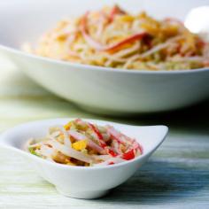 Spicy Kani Salad - a sushi shop favorite you can make at home! Our spicy kani salad recipe taste just like the dish you order at your neighborhood Japanese. Spicy Kani Salad is a tribute to balance: cool and spicy, silky and crisp, sweet and tart, light and filling. The spicy dressing caresses the smooth cooling ribbons of cucumber, crab meat and mango, sprinkled with crunchy panko.