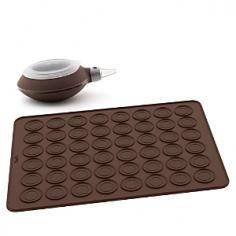 Molds & Specialty Bakeware - Bake light and perfectly round French macaroons in less time with the Lekue Macaroon Kit. The easy-to-use macaroon making kit includes a special silicone macaroon baking sheet, Decomax decorating pen and recipe booklet. The platinum silicone baking sheet includes marks and edges to ensure uniform size and shape. Ergonomic Lekue macaroon kit decorating pen design helps reduce hand fatigue. Dishwasher-safe.A leading worldwide food-safe silicone company, Lekue offers healthy cooking solutions for the day-to-day kitchen. The Lekue silicone steam cooking collection has earned a number of prestigious international design awards. Set Includes: Silicone macaroon baking sheet Decomax decorating pen Recipe booklet Product Features Evenly bake uniform-shaped French macaroons in less time Set includes special silicone macaroon baking sheet, Decomax pen and recipe booklet Platinum silicone baking sheet includes marks and edges for uniform size and shape Platinum (white gold) silicone's unique - Specifications Made in Spain Material: food-safe platinum silicone, ABS plastic Model: 3000001SURM017 Use and Care Lekue platinum silicone is dishwasher-safe or hand wash in warm, soapy water and rinse thoroughly.