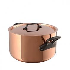 This 6.5-qt. Stew Pan with Lid and Cast Iron Handles can be used as a stockpot or a casserole. You can use it to braise, roast, make soups or giant batches of sauces! It's also great for boiling water or making a large batch of chili. It is also ideal to use for recipes that require high-heat sauteing and sustained simmering. It's crafted from copper and has a stainless steel interior that won't interact with foods and makes for easy cleaning. Copper is a terrific choice for cookware because it is twice more conductive than aluminum and ten times more conductive than stainless steel. No wonder copper is the most preferred material of cookware by popular chefs and avid home cooks; its ability to heat up evenly and rapidly and to cool down just as quick allows for maximum control and excellent cooking results. Please handwash with mild dish soap. Made in France. The Cuprinox cookware line features an extra-thick 2.5mm copper exterior and includes a thin layer of stainless steel on the interior of the line's pots and pans. The stainless interior resists sticking, doesn't react with acidic foods, and cleans easily with a sponge. The cookware also offers durable handles anchored with rivets that hold up to heavy use. Mauviel, a French family business established in 1830 and located in the Normandy town of Villedieu-les-Poeles, is the foremost manufacturer of professional copper cookware in the world today. Highly regarded in the professional world, with over 170 years of experience, Mauviel offers several different lines of copper cookware to professional chefs and home cooks that appreciate the benefits of their high quality products.