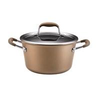 The efficient shape of the Anolon Advanced Bronze Hard Anodized Nonstick 4-1/2-Quart Covered Tapered Stockpot is ideal for foods that cook slowly, like a fragrant, simmering marinara sauce created with fresh-picked Roma tomatoes and sweet Italian basil. The stockpot's heavy-duty hard-anodized construction promotes even and efficient heating, and the sleek and modern bronze nonstick exterior adds a timeless touch of style to any kitchen decor. Restaurant-quality DuPont Autograph 2 nonstick interior is long lasting and metal utensil safe, and makes cleaning up effortless after preparing a hearty cannellini bean and turkey chili. Color-coordinated Anolon SureGrip handles are dual riveted for extra strength and designed for a comfortable grasp. The break-resistant glass lid allows for constant monitoring of food while it cooks, locking in heat and moisture, and the stockpot is oven safe to 400 F. This essential stockpot is the perfect complement to all other pieces in the Anolon Advanced collections. With its elegant shape and sleek design, this Anolon Advanced Bronze Hard Anodized Nonstick 4-1/2-Quart Covered Tapered Stockpot is a graceful and efficient addition to the gourmet-quality kitchen. The unique, attractive flared shape and soft metallic tint provide a fresh alternative look to traditional gourmet cookware without sacrificing a speck of first-rate performance.