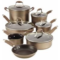 This cookware set is an exceptional value, including every essential piece of cookware your kitchen truly needs. You could be set for life - breakfast, lunch and dinner. From sunrise to sunset, from simple family meals to elegant entertaining, this set covers the bases, giving you gourmet performance at home. Metal utensil safe Anolon Advanced pots and pans are made of heavy gauge hard anodized aluminum to ensure efficient, even heat distribution for exceptional cooking performance. The revolutionary ergonomic SureGrip- handle, a combination of durable stainless steel and silicone rubber, provides a confident yet soft grip and is oven safe to 400 F. DuPont's rugged Autograph 2 nonstick surface inside and out is ideal for both healthy cooking and easy cleanup. Restaurant tested by professional chefs, Autograph 2 surpasses all other standard nonstick formulas by delivering superior durability that stands up to the rigors of a professional kitchen. The break-resistant, domed-shaped tempered glass lids allow you to monitor food while it cooks, without losing moisture or nutrients. Anolon Advanced cookware offers a sophisticated professional look that will complement every kitchen. Includes: 1 Qt. Saucepan 2 Qt. Covered Saucepan 3 Qt. Covered Saucepan 8 Qt. Covered Stockpot 8.5" Skillet 12" Covered Deep Skillet 3 Qt. Covered Saute