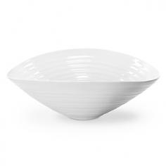 Made of sturdy porcelain. Modern, organic styling and ridges. Round salad bowl. Microwave- and dishwasher-safe. Available in a variety of sizes. A salad served in the Sophie Conran White Salad Bowl is a sight to behold. This stylish, yet sturdy porcelain bowl will highlight each ingredient. Simple salads will never be the same. Plus, it's safe for the freezer, oven, microwave and dishwasher. About PortmeirionStrikingly beautiful, eminently practical, refreshingly affordable. These are the enduring values bequeathed to Portmeirion by its legendary co-founder and designer, Susan Williams-Ellis. Her father, architect Sir Clough Williams-Ellis, was the designer of Portmeirion, the North Wales village whose fanciful architecture has drawn tourists and artists from around the world (including the creators of the classic 1960s TV show The Prisoner). Inspired by her fine arts training and creation of ceramic gifts for the village's gift shop, Susan Williams-Ellis (along with her husband Euan Cooper-Willis) founded Portmeirion Pottery in 1960. After 50+ years of innovation, the Portmeirion Group is not only an icon of British design, but also a testament to the extraordinarily creative life of Susan Williams-Ellis. The style of Portmeirion dinnerware and serveware is marked by a passion for both pottery manufacturing and trend-setting design. Beautiful, tactile, nature-inspired patterns are a defining quality of Portmeirion housewares, from its world-renowned botanical designs modeled on antiquarian books to the breezy, natural colors of its porcelain and earthenware. Today, the Portmeirion Group's design legacy continues to evolve, through iconic brands such as Spode, the Pomona Classics collection, and the award-winning collaboration of Sophie Conran for Portmeirion. Sophie Conran for Portmeirion: Successful collaborations have provided design inspiration throughout Sophie Conran's life. Her father, designer Sir Terence Conran, and mother, food writer Caroline Conran, have been the pillars of her eclectic mix of cooking, writing, and interior design. In pairing with the iconic British housewares brand Portmeirion, Conran has created another successful collaboration: Sophie Conran for Portmeirion, an award-winning collection of dinnerware, serveware, and drinkware for the practical, multi-functional needs of contemporary kitchens. Launched in 2006, Sophie Conran for Portmeirion immediately received the Elle Deco Style Award for Best in Kitchens, and two years later, the House Beautiful Award for Best in Tableware. The soulful, tactile beauty of these oven-to-tableware pieces is exemplified by rippled surfaces and edges that evoke a potter's hand. This down-to-earth style is complemented by charming pastels, gentle earth tones, and classic whites and pinks, for a collection that will lighten and enliven contemporary kitchen decors. Though delicate to the eye and touch, these plates and bowls are built for durable performance, with microwave- and dishwasher-safe porcelain that's casual enough for breakfast and elegant enough for eye-catching dinners. Size: Large.