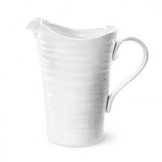 Made of sturdy porcelain. Holds up to 48 ounces. Contemporary-styled pitcher in white. Microwave- and dishwasher-safe. Available in a variety of sizes. If you're looking for a solid addition to your dinnerware collection, the Sophie Conran White Pitcher / Jug is it. This generous pitcher is crafted of durable porcelain. It's freezer, microwave, oven and dishwasher safe, making it the perfect choice for serving up a multitude of delicious beverages. About PortmeirionStrikingly beautiful, eminently practical, refreshingly affordable. These are the enduring values bequeathed to Portmeirion by its legendary co-founder and designer, Susan Williams-Ellis. Her father, architect Sir Clough Williams-Ellis, was the designer of Portmeirion, the North Wales village whose fanciful architecture has drawn tourists and artists from around the world (including the creators of the classic 1960s TV show The Prisoner). Inspired by her fine arts training and creation of ceramic gifts for the village's gift shop, Susan Williams-Ellis (along with her husband Euan Cooper-Willis) founded Portmeirion Pottery in 1960. After 50+ years of innovation, the Portmeirion Group is not only an icon of British design, but also a testament to the extraordinarily creative life of Susan Williams-Ellis. The style of Portmeirion dinnerware and serveware is marked by a passion for both pottery manufacturing and trend-setting design. Beautiful, tactile, nature-inspired patterns are a defining quality of Portmeirion housewares, from its world-renowned botanical designs modeled on antiquarian books to the breezy, natural colors of its porcelain and earthenware. Today, the Portmeirion Group's design legacy continues to evolve, through iconic brands such as Spode, the Pomona Classics collection, and the award-winning collaboration of Sophie Conran for Portmeirion. Sophie Conran for Portmeirion: Successful collaborations have provided design inspiration throughout Sophie Conran's life. Her father, designer Sir Terence Conran, and mother, food writer Caroline Conran, have been the pillars of her eclectic mix of cooking, writing, and interior design. In pairing with the iconic British housewares brand Portmeirion, Conran has created another successful collaboration: Sophie Conran for Portmeirion, an award-winning collection of dinnerware, serveware, and drinkware for the practical, multi-functional needs of contemporary kitchens. Launched in 2006, Sophie Conran for Portmeirion immediately received the Elle Deco Style Award for Best in Kitchens, and two years later, the House Beautiful Award for Best in Tableware. The soulful, tactile beauty of these oven-to-tableware pieces is exemplified by rippled surfaces and edges that evoke a potter's hand. This down-to-earth style is complemented by charming pastels, gentle earth tones, and classic whites and pinks, for a collection that will lighten and enliven contemporary kitchen decors. Though delicate to the eye and touch, these plates and bowls are built for durable performance, with microwave- and dishwasher-safe porcelain that's casual enough for breakfast and elegant enough for eye-catching dinners. Size: Large.