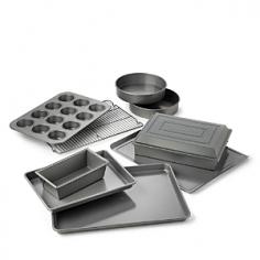 10-piece nonstick bakeware set. Interlocking nonstick layers. Heavy-gauge steel cores for even heating. Dishwasher safe. Manufacturer's full lifetime warranty. Even those stickiest, trickiest, gooiest desserts are no match for the Calphalon Nonstick Bakeware 10-Piece Set, which features interlocking nonstick layers for high release. You'll get it all with this set, including a 12-cup muffin pan, a 12 x 17-inch baking sheet, a medium loaf pan, two 9-inch round cake pans, a 14 x 17-inch cookie sheet, a 9 x 13-inch brownie pan, a 9 x 13-inch covered cake pan, and a cooling rack. The heavy-gauge steel cores help create even heating across the surface, and all pieces are dishwasher safe. Includes manufacturer's full lifetime warranty. About CalphalonCalphalon's mission is to be the culinary authority in kitchenwares, enhancing the home chef's food experience during planning, prep, cooking, baking, and serving. Based in Toledo, Ohio, Calphalon is a leading manufacturer of professional quality cookware, cutlery, bakeware, and kitchen accessories for the home chef. Calphalon is a Newell-Rubbermaid company. Calphalon's goal is to give you, the home chef, all the tools you need to realize your highest potential in the kitchen. From your holiday roasting pan to your everyday fry pan, count on Calphalon to be your culinary partner - day in and day out, for breakfast, lunch, and dinner for a lifetime.