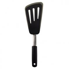 Utensils & Sets - The OXO Flexible Silicone Omelette Turner takes the worry and mess out of turning and flipping delicate foods without tearing. With its blend of strong stainless-steel and flexible high-heat resistant silicone, the omelette turner offers thin, flexible edges that glide easily under foods, including fragile eggs, fish fillets and thin vegetables, keeping foods in one piece. The silicone outer layer is heat resistant to 600 F and safe for nonstick cookware and bakeware. The silicone is bonded to a flexible stainless-steel core for added stability. The silicone turner is ideal for flipping longer foods like enchiladas and whole fish. The silicone utensil offers a comfortable, nonslip cushioned handle grip. Dishwasher-safe. OXO is the leading kitchen tool supplier to the world's gourmet kitchens. Originally engineered to assist the inventor's wife with her arthritic hands, the Good Grips line in OXO kitchen tools is recognized by several national and international organizations for superior - Specifications Material: stainless-steel, Santoprene, silicone Made in China Model: 1071532 Size: 7"L (13 3/4" with handle) x 4"W Weight: 5 oz. Use and Care Dishwasher-safe Silicone head is heat resistant to 600 F and safe for nonstick cookware and bakeware.