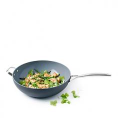 The GreenPan Paris 12½" wok is made with durable hard-anodized aluminum on the outside and Thermolon healthy ceramic nonstick coating for easy cleanup and food release on the inside. Plus, the helper handle makes it easier to move around the kitchen. hard-anodized aluminum provides quick and even heat distribution Thermolon ceramic coating is healthy, safe and does not contain any toxic chemicals or persistent pollutants no harmful fumes, peeling, chipping or flaking off of the coating PFOA, lead and cadmium free 60 less CO2 is emitted during the curing phase of production of Thermolon coatings, compared to the emissions during the curing phase of production of traditional coatings GreenPan processes used materials-such as upcycled stainless steel for the handles and upcycyled aluminum for cookware bodies-into new products to prevent waste of potentially useful materials stainless steel handles coating is heat resistant to 850ºF Aluminum with stainless steel handle and ceramic nonstick coating. Dishwasher safe. Imported.