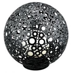 Round metal frame with cut-out circles and black finish White glass globe shade Rated for outdoor use Requires one 100-watt A19 bulb (not included)Dimensions: 17.75 diam. x 17.75H inches. An upscale way to illuminate your outdoor living space, this Eglo USA Ferroterra 89565A Outdoor Accent Lamp has a unique round shape, fun cut-out circles, and is rated for wet conditions. About EGLOEGLO Group is an international enterprise with Tyrolean roots. At home all over the world, this company blends Austrian traditions with cultural influences for a varied and creative product range. EGLO was founded in 1969 by Ludwig Obwieser and launched as EGLO Leuchten in Austria. For over 40 years they have evolved into a leading manufacturer of decorative interior lighting. EGLO creates trends. Over 90% of their lighting products are designed in-house and come from constant exchanges with customers, suppliers, and respected designers. EGLO: my light, my style.