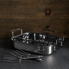 Classically styled and polished. Stainless steel exterior and a satin finished interior. Designed with 3 layers to ensure even, consistent heating. Oven and broiler safe with stay-cool handles. Dishwasher safe and induction capable. You don't have to be so serious about roasting that you're considering putting roaster right above the phone number on your business cards, but for the best roasting experience around, you definitely need to try out the Calphalon Tri Ply Stainless Steel 14 in. Roaster with Rack and Lifters. The 3-layer body helps evenly distribute heat across the surface of the roaster, while a curved rack keeps your meal right in the center and won't burn the bottom. An easy-to-clean interior has a bright, glossy finish while brushed stainless adorns the outside. A pair of lifting forks helps you move the contents around, and everything in this set is both dishwasher and oven-safe. About CalphalonCalphalon's mission is to be the culinary authority in kitchenwares, enhancing the home chef's food experience during planning, prep, cooking, baking, and serving. Based in Toledo, Ohio, Calphalon is a leading manufacturer of professional quality cookware, cutlery, bakeware, and kitchen accessories for the home chef. Calphalon is a Newell-Rubbermaid company. Calphalon's goal is to give you, the home chef, all the tools you need to realize your highest potential in the kitchen. From your holiday roasting pan to your everyday fry pan, count on Calphalon to be your culinary partner - day in and day out, for breakfast, lunch, and dinner for a lifetime.