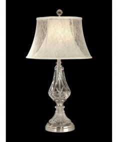 Constructed of metal and crystal. Table lamp in transitional style. High-quality fabric shade. Requires (1) 150-watt E27 bulb (not included). Dimensions: 14.5L x 14.5W x 26.5H inches. Add a gorgeous, elegant touch to your living room decor with the Dale Tiffany Lawrence Table Lamp. This beautiful lamp has a cut crystal body on a metal base, and a double-walled fabric shade - lacy floral on the outside, with a solid bell shade inside. About Dale TiffanyFounded in 1979, Dale Tiffany, Inc. started manufacturing Tiffany-styled lamps and shades, emphasizing high-quality reproductions of Louis Comfort Tiffany's famous designs. Today, using only the highest quality genuine hand-rolled art glass, Dale Tiffany offers an extensive range of designs to comprise the world's foremost collection of fine art glass lighting and home accents. With this hand-crafted process, no two pieces are exactly alike, making each design a treasured keepsake. Dale Tiffany captures the timelessness of America's classic designers while developing unique designs that blend perfectly with today's home fashion trends and lifestyles.