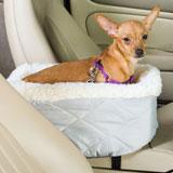 Snoozer console pet car seat with it's patented design allows your pet to have the comfort and security of riding next to you while in the car. The design being firm yet comfortable foam form. The snoozer console pet car seat attaches easily to your car's console.