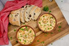 Cheesy Mushrooms in a Creamy Garlic Sauce served in tapas dishes, starter for two. Served with Olive Bread