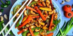 A vegetarian cashew nut stir fry with mixed vegetables and noodles